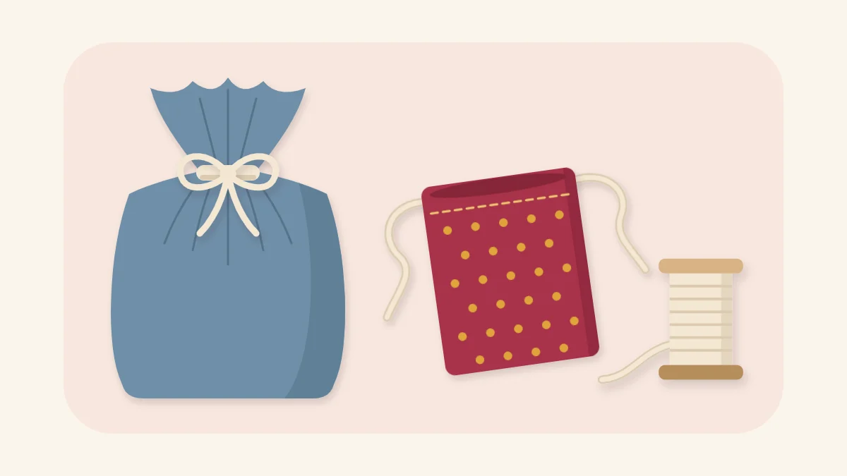Two cotton drawstring gift bags, one cinched closed and one lying open