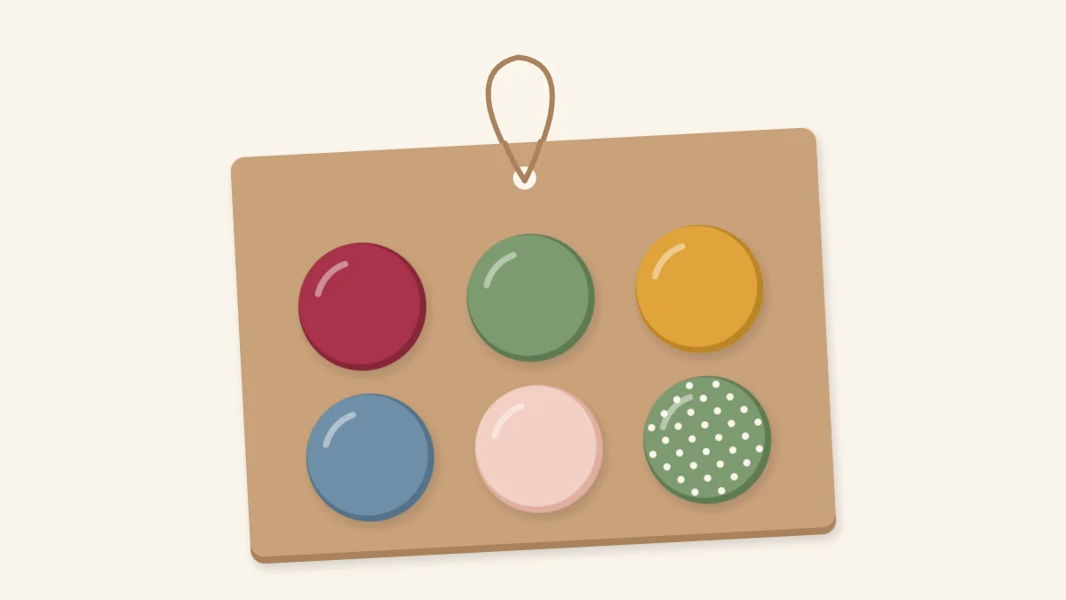 Six fabric-covered button magnets displayed on a kraft card