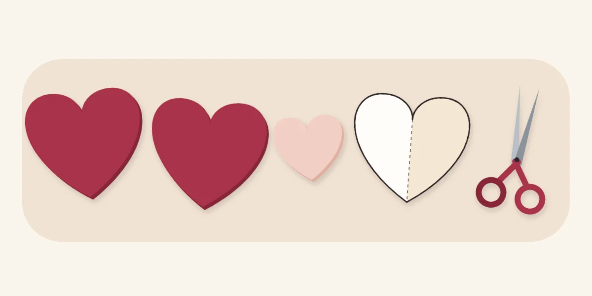 Two large felt hearts, one small felt heart and the folded paper template