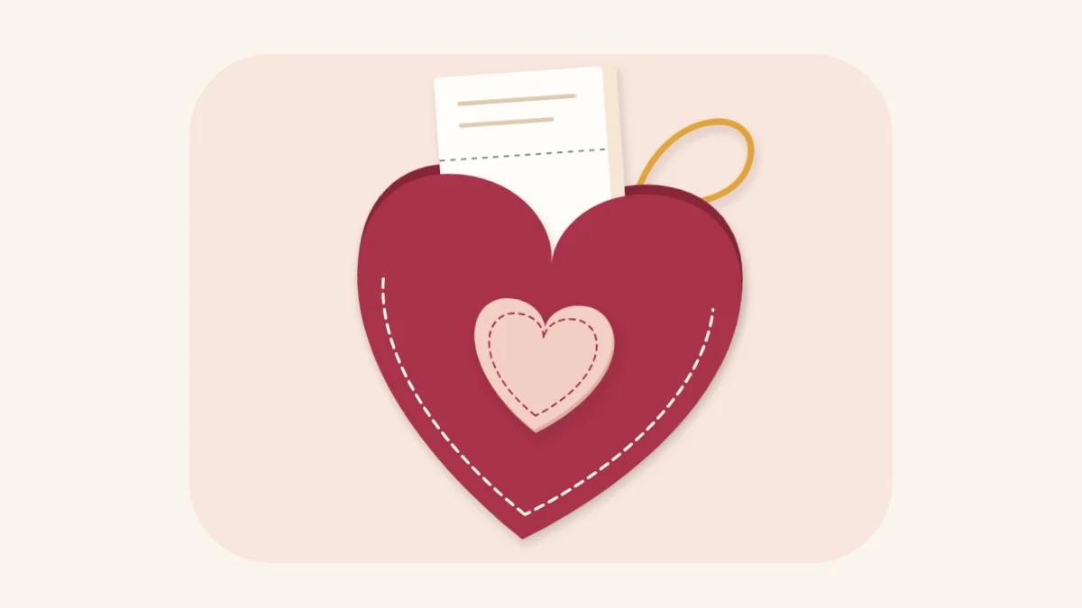 Berry felt heart pocket with a folded note tucked into its open top
